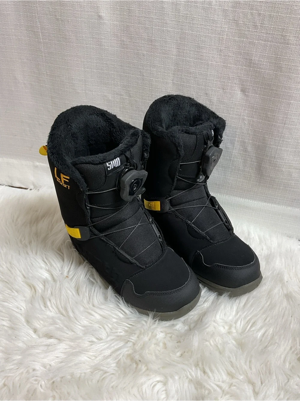 Kids Black Snow Boots with Quick-Pull Closure and Yellow Accent